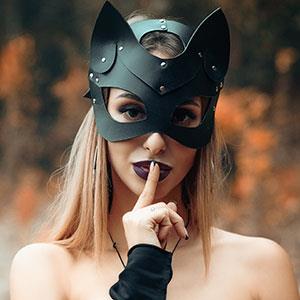 woman in leather cat mask