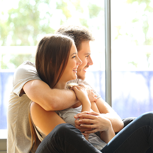 christian couple smiling, happy.