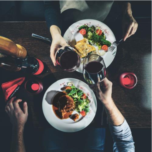 couple on a date, red wine, good food.