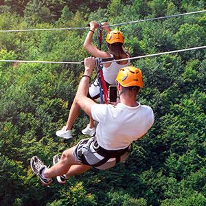 active couples on a zip line