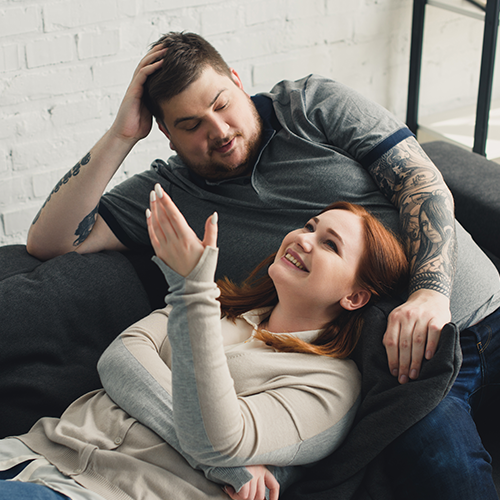 Curvy Couple Smiling.